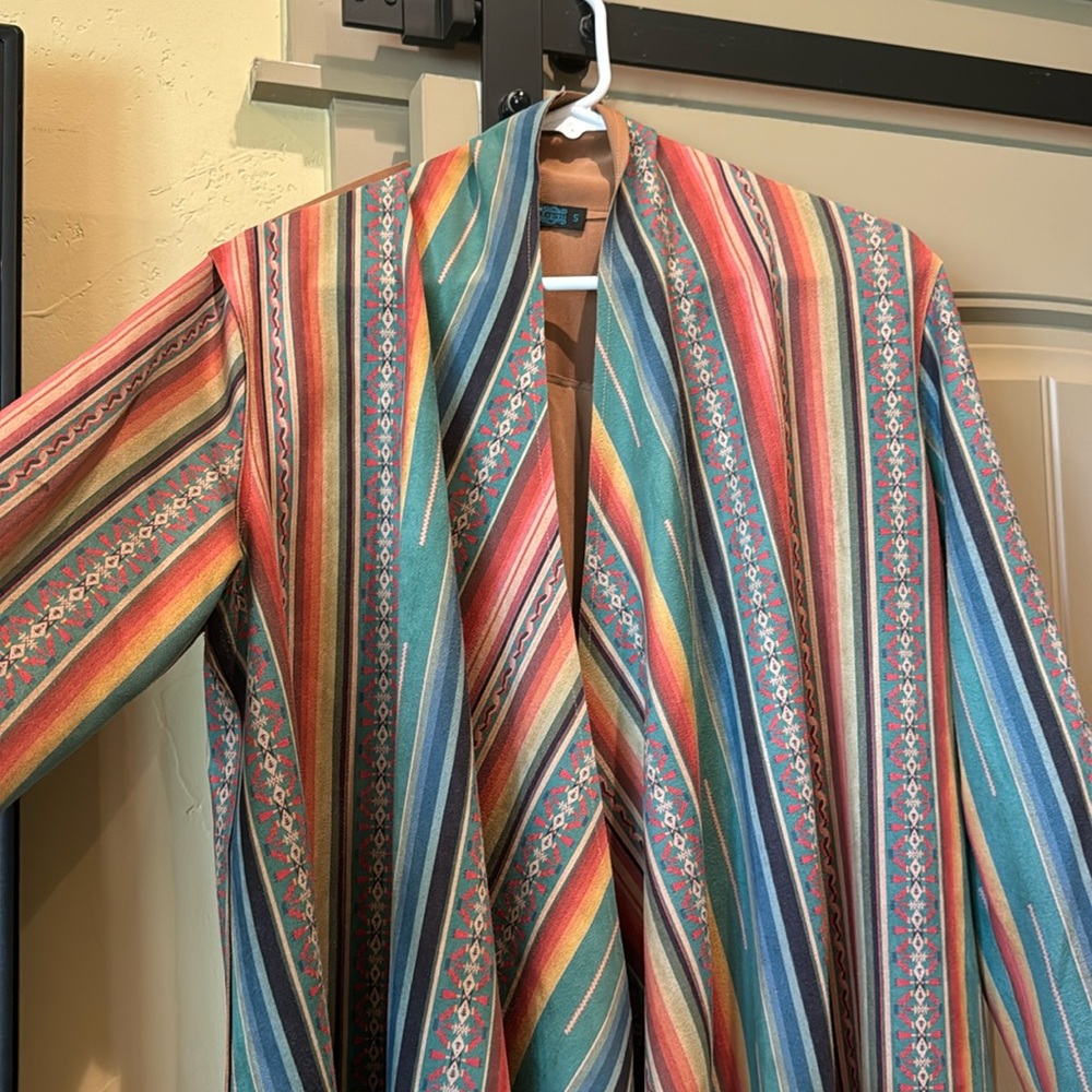 Open front, fringe detailed, long sleeve brushed polyester jacket